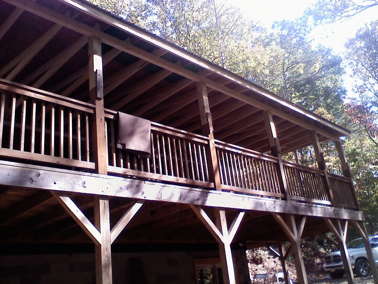 Timber framing under a new elevated porch and deck in Litchfield